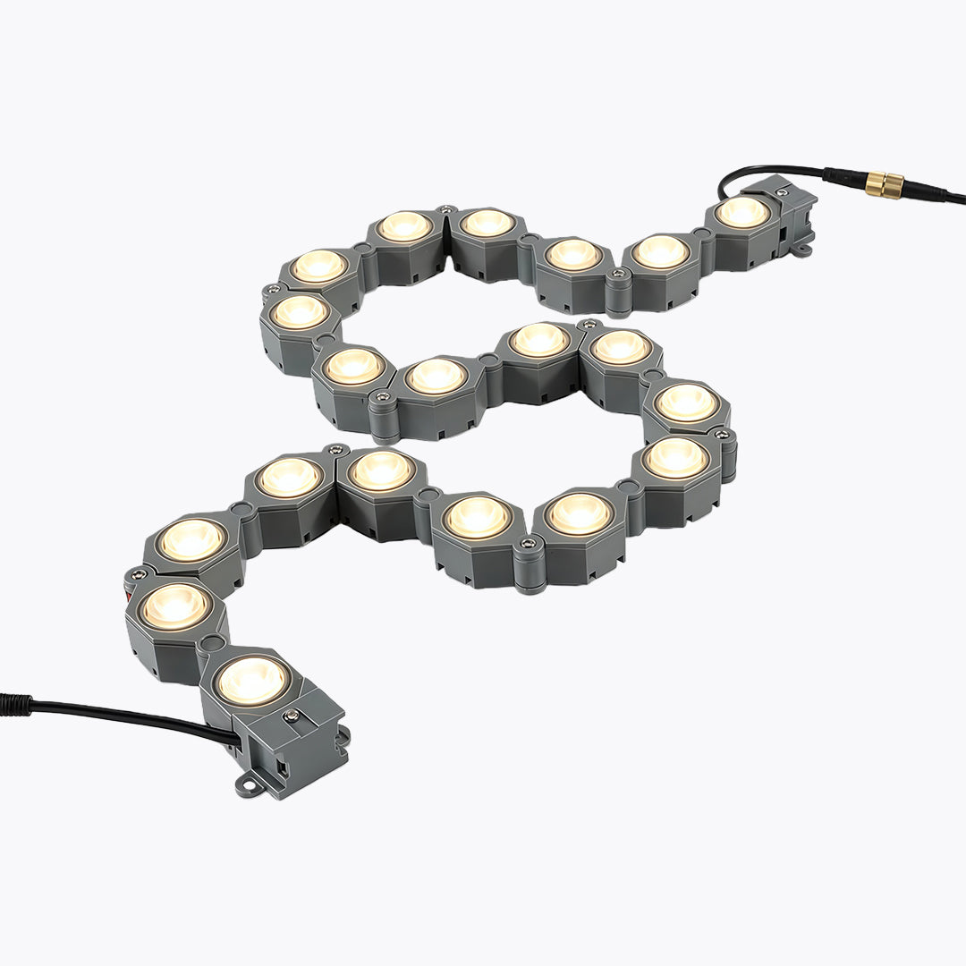 Professional DIY wall wash lighting with glass shade chandelier aesthetic in curved configuration demonstrating flexible installation.