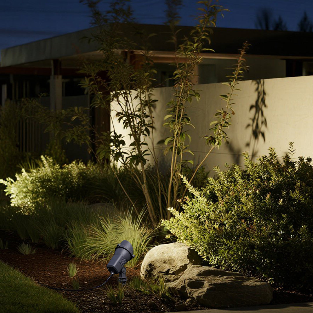 Professional LED spotlight with directional capability and ground mounting for architectural accent lighting