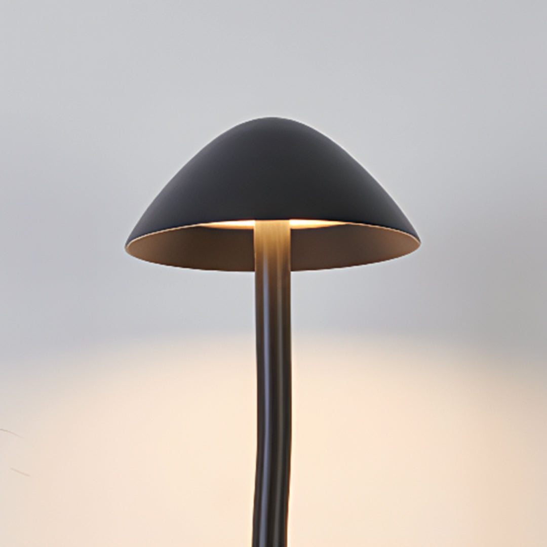 Professional mushroom garden light installation with warm downward illumination highlighting contemporary landscape architecture