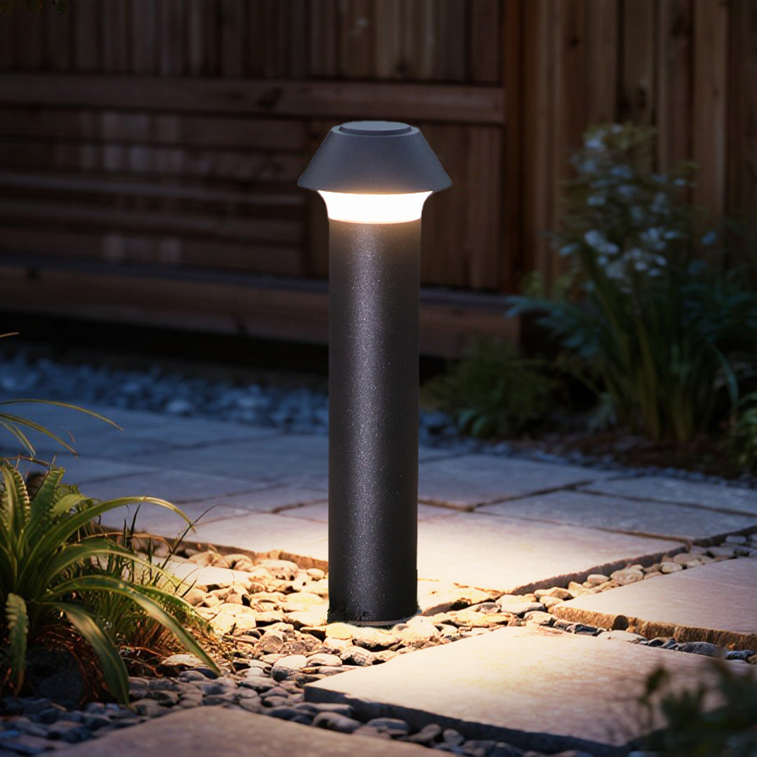 Professional landscape design showcasing pagoda bollards integrated with natural stone elements