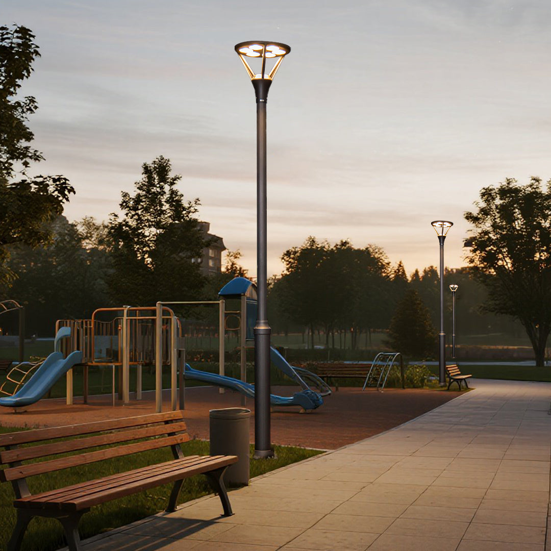 Public park lighting with ornate lamp posts creating safe and attractive evening recreation space