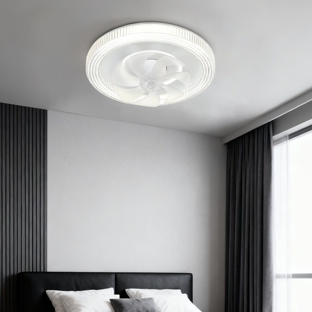 The quiet circular ceiling fan with light installed in a cozy, black and white themed bedroom with plush bedding and high contrast walls. 
