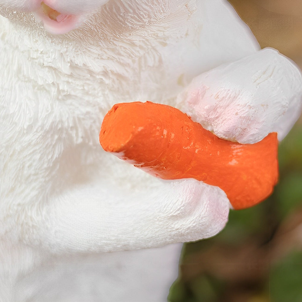Close-up of a rabbit garden light with a realistic carrot, highlighting its playful design.