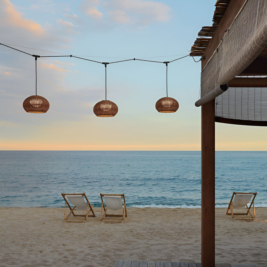 Rattan outdoor pendant light hanging in a modern living room with a cozy ambiance.