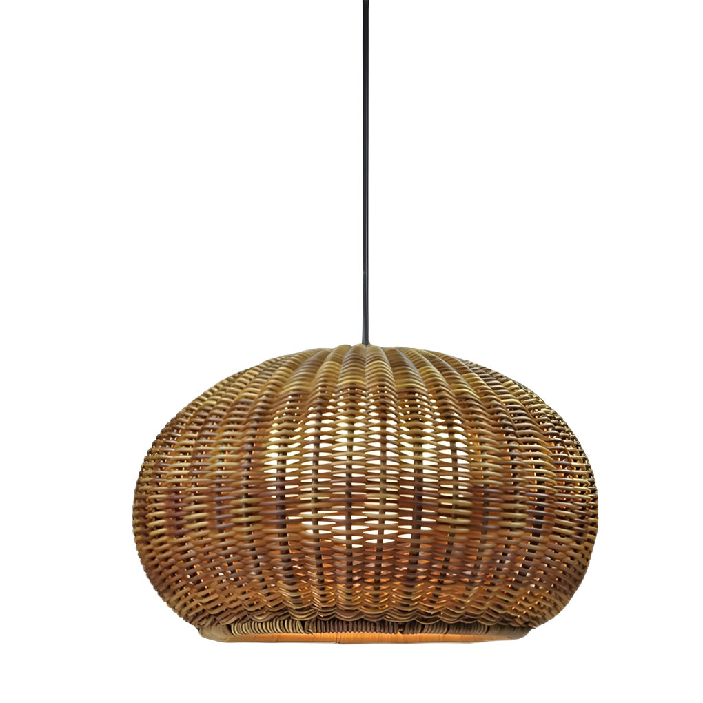 Rattan outdoor pendant light in natural rattan, hanging above a table for a rustic look.