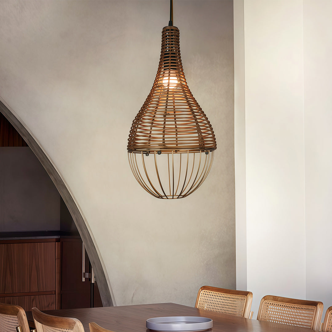 Rattan pendant light illuminating a modern home office, blending natural materials with contemporary design.