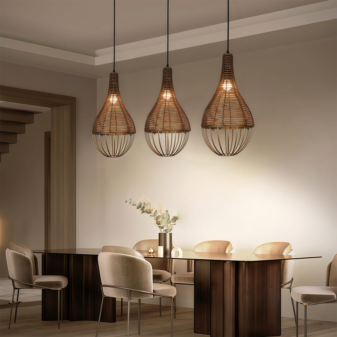 Rattan pendant light hanging in a minimalist living room, providing soft and organic illumination.