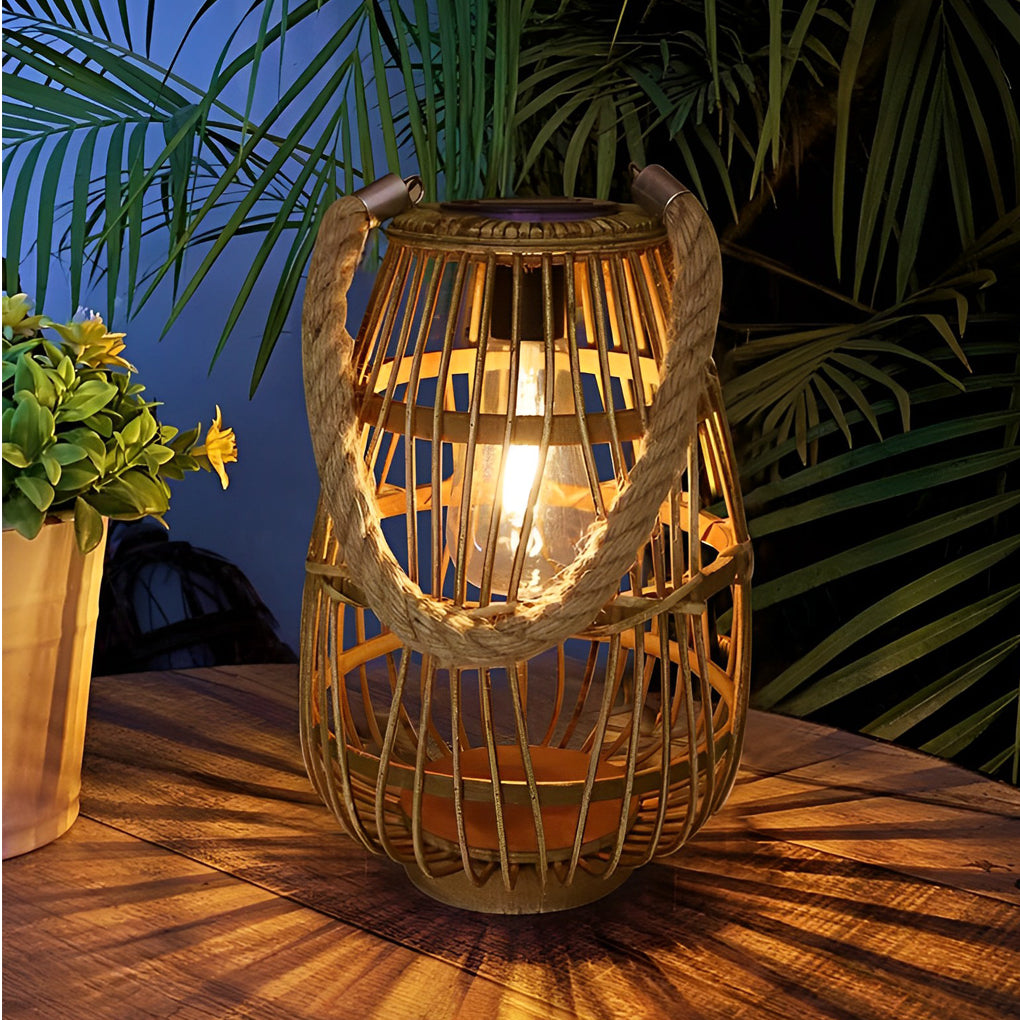 Rattan solar lantern with a natural finish, placed on a wooden deck.