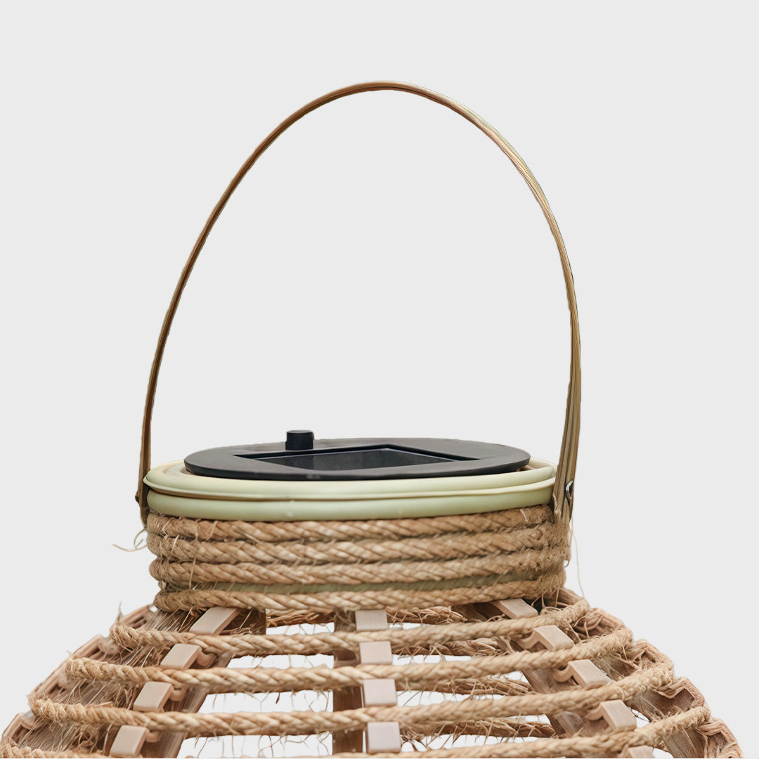 Top view of rattan solar lantern with built-in solar panel and carrying handle.