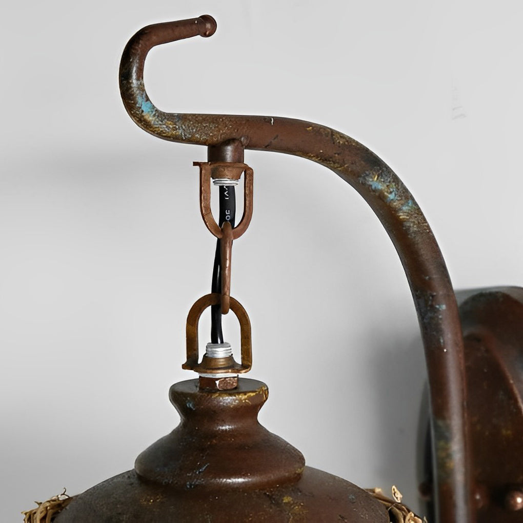 Rattan wall lamp with a vintage style, illuminating a cozy corner.