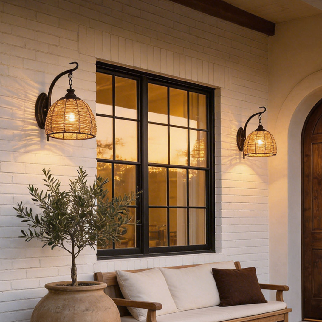 Rattan wall lamp with a woven shade, enhancing a modern living room.