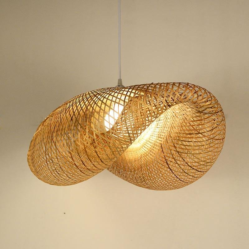Rattan wave pendant light product image against a neutral indoor background.