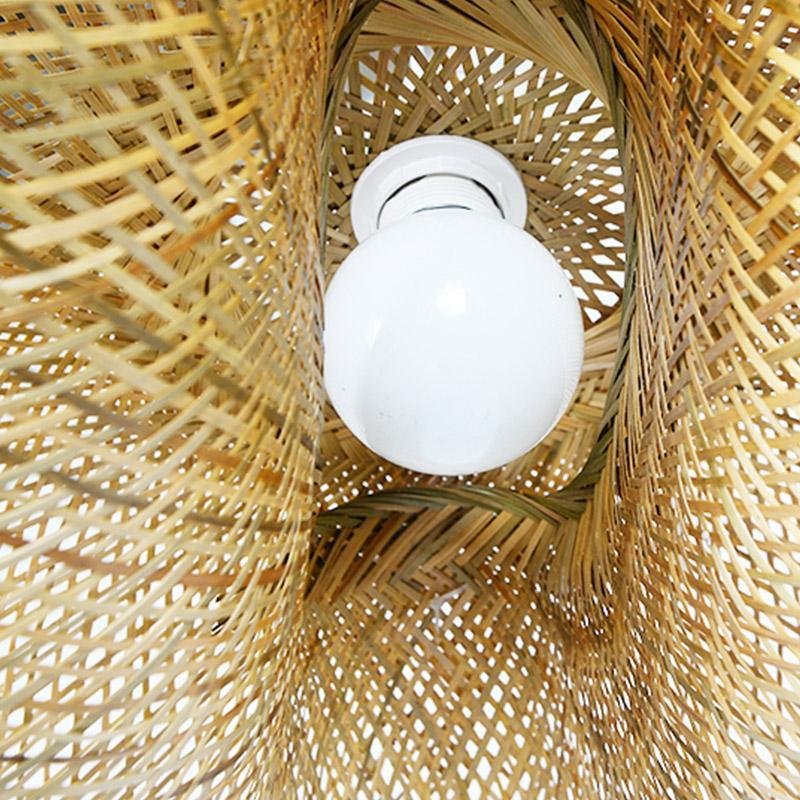 Rattan wave pendant light inner structure detail with exposed bulb.