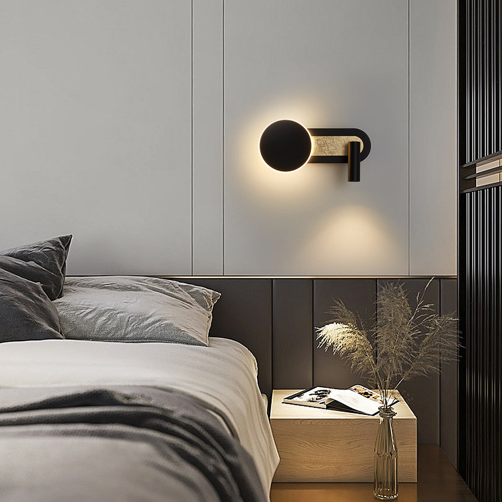 Reading light for bed wall mounted beside a sofa, providing warm light for a cozy corner.