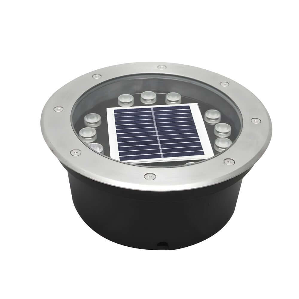 Recessed floor lighting along a narrow garden walkway, creating a warm and inviting outdoor atmosphere.