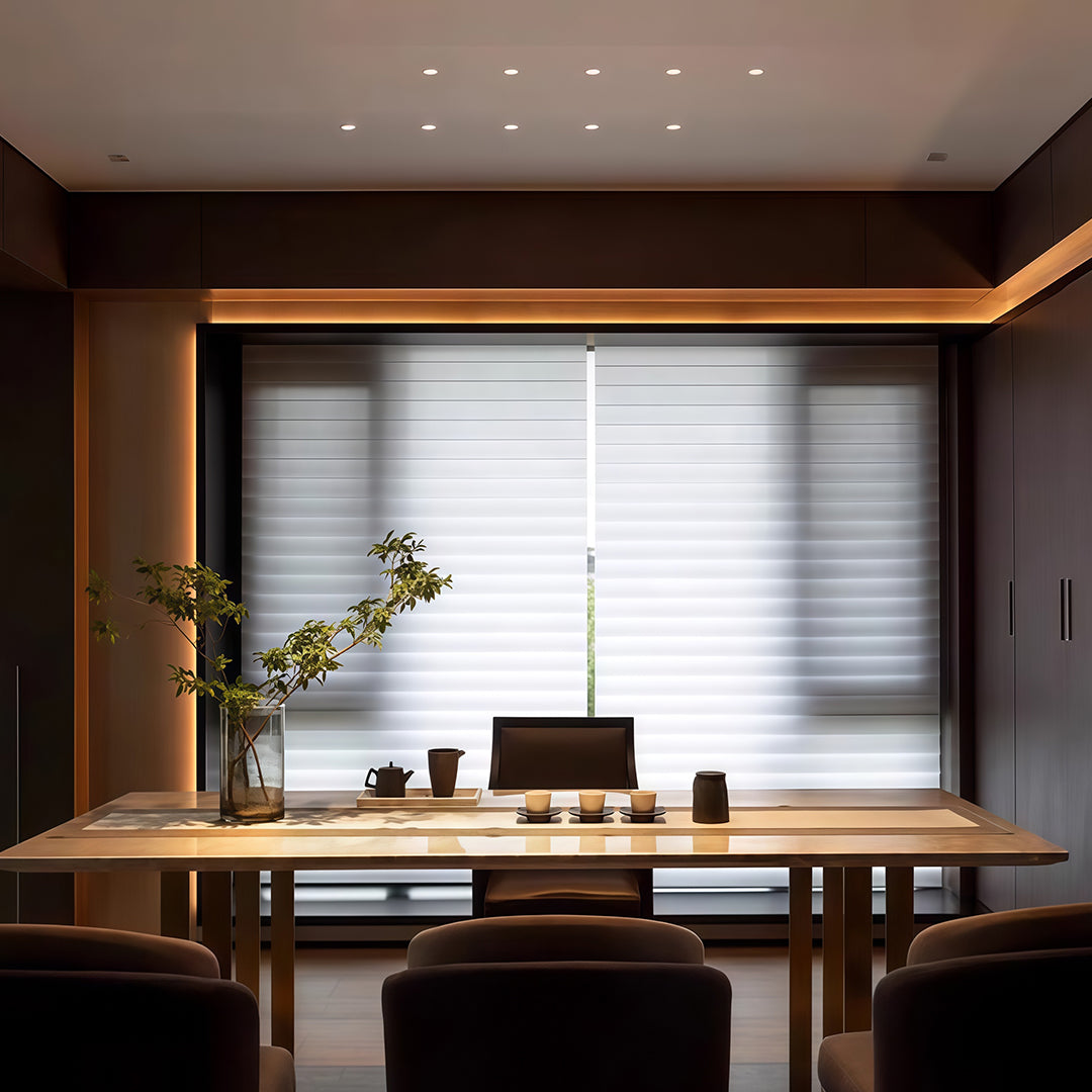 Recessed indoor spotlights with glass shade chandelier aesthetic creating dramatic lighting in wood-paneled study space.