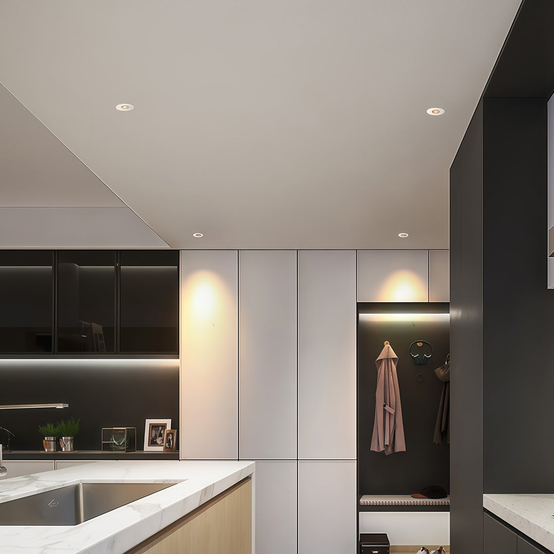 Recessed LED ceiling lights installed in contemporary kitchen providing focused task and ambient lighting