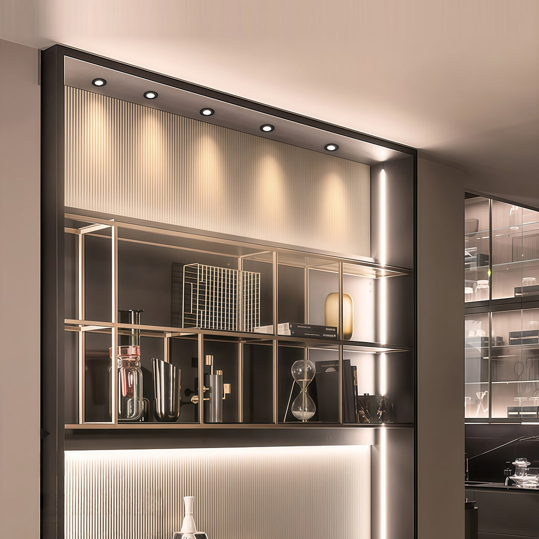 Recessed ceiling spotlights providing ambient illumination in modern luxury bar and dining area