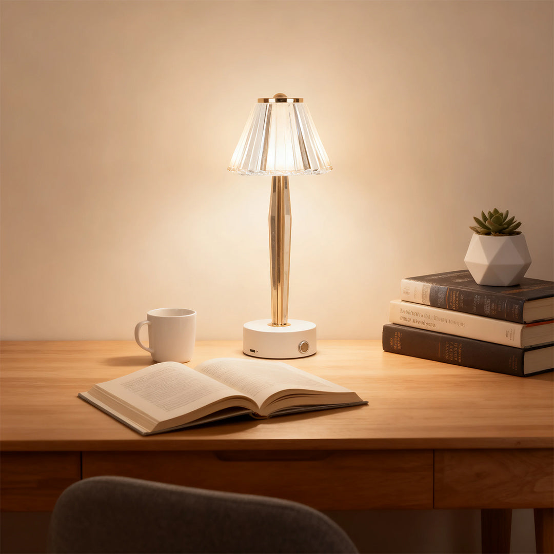 Rechargeable classic table lamp on a wooden desk next to an open book, perfect for focused reading light.