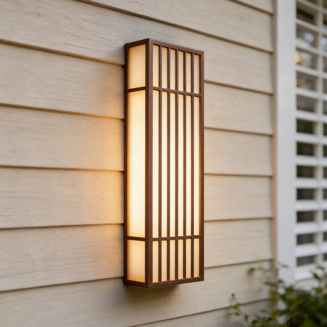 Rectangle LED outdoor wall light mounted on a light exterior wall with a slim vertical frame and warm glow.rectangle-led-outdoor-wall-light-light-exterior-wall