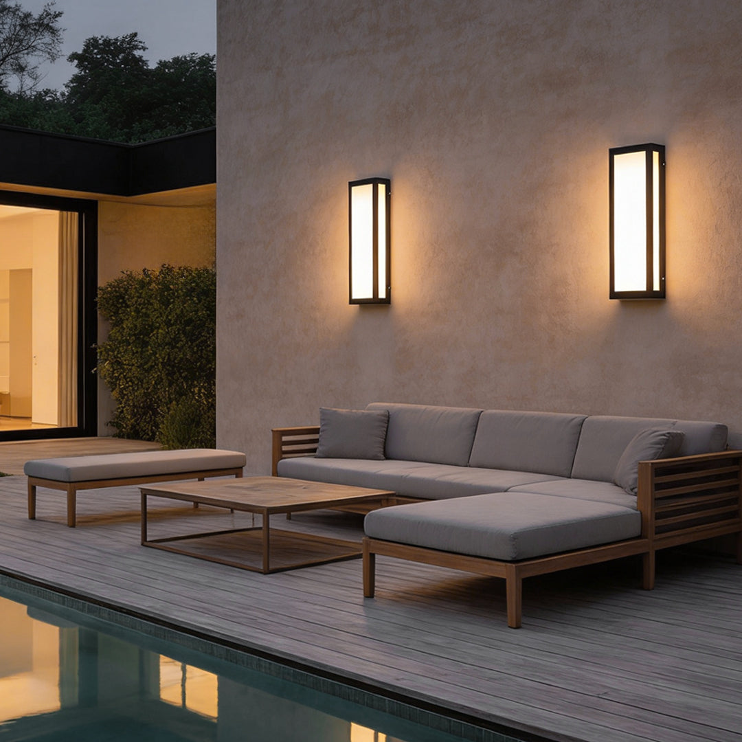 Rectangle outdoor wall lighting beside outdoor seating area with pool view.