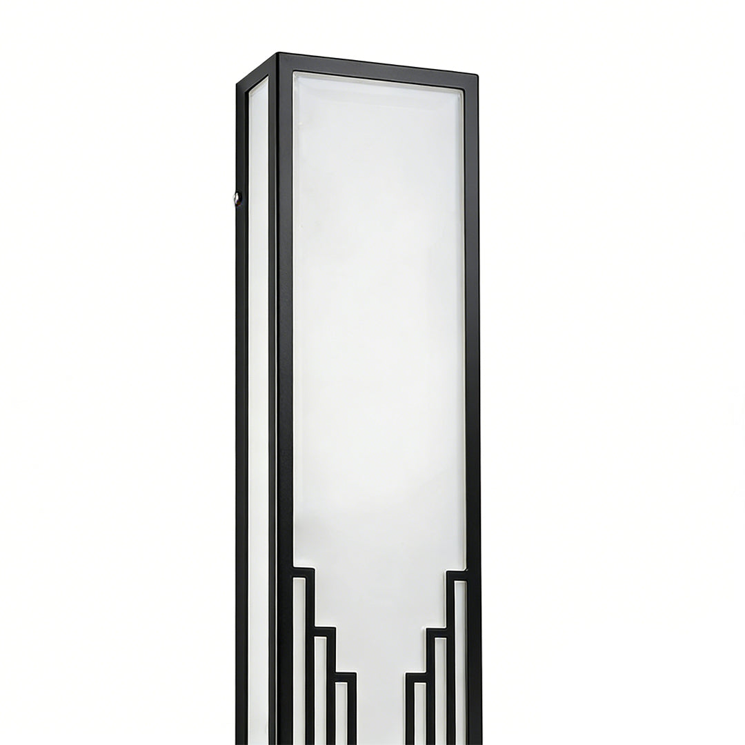 Rectangular exterior wall sconce with a minimalist design, providing soft light in a hallway.
