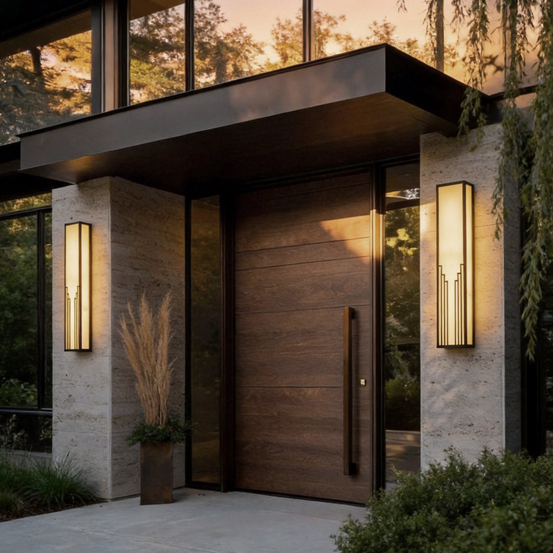 Rectangular exterior wall sconce with a modern design, illuminating a contemporary house entrance.