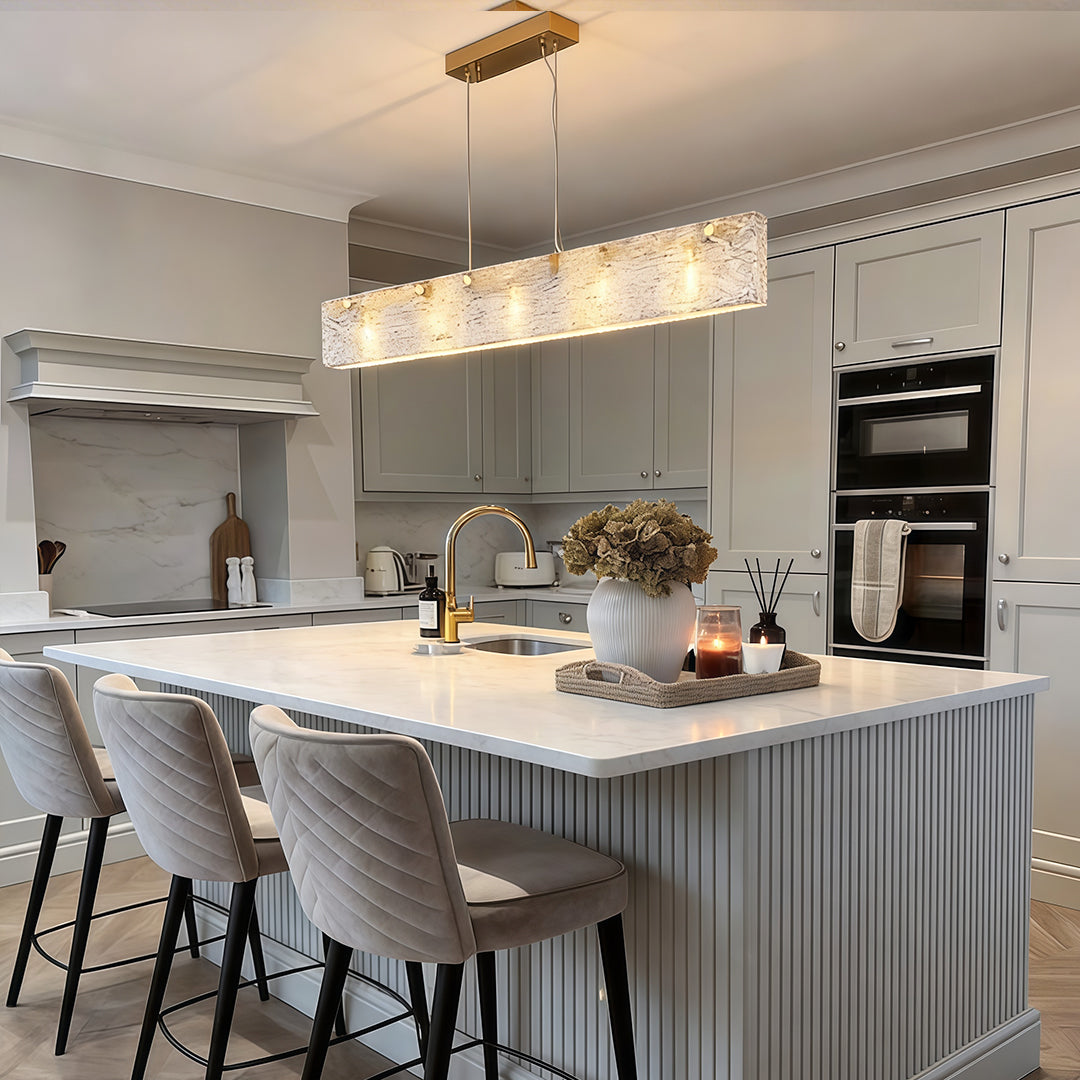 Rectangular glass chandelier with a minimalist design, enhancing a contemporary dining area.