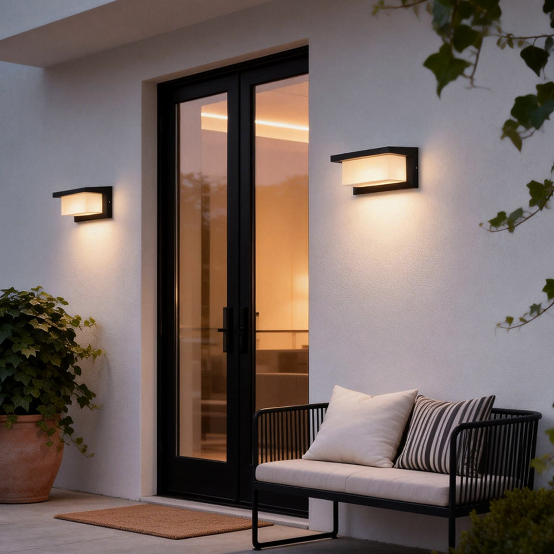 Rectangular outdoor wall lights enhancing a contemporary patio with elegant ambient light.