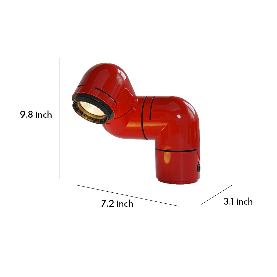 Red statement table lamp with a curved industrial design, adding a bold accent to modern interiors.