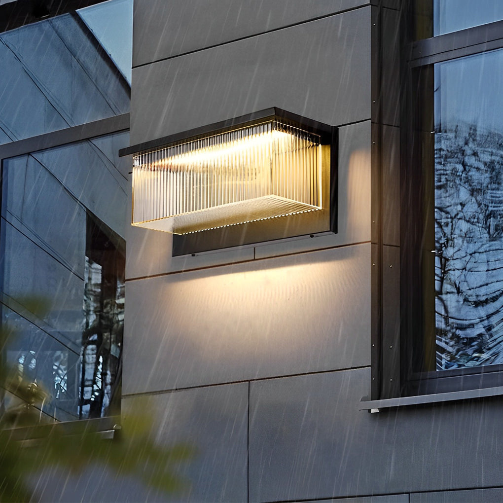 Reeded acrylic sconce with close-up of its textured design and light output.