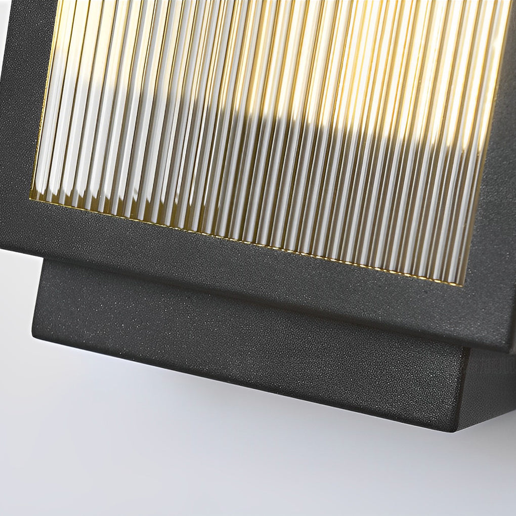 Reeded glass light in a black finish, providing a sleek and sophisticated lighting solution for exteriors.