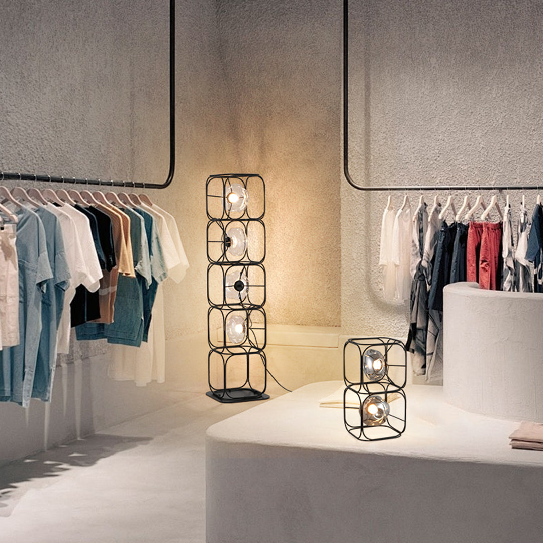 Restaurant cube table lamp providing intimate dining atmosphere with warm geometric lighting design