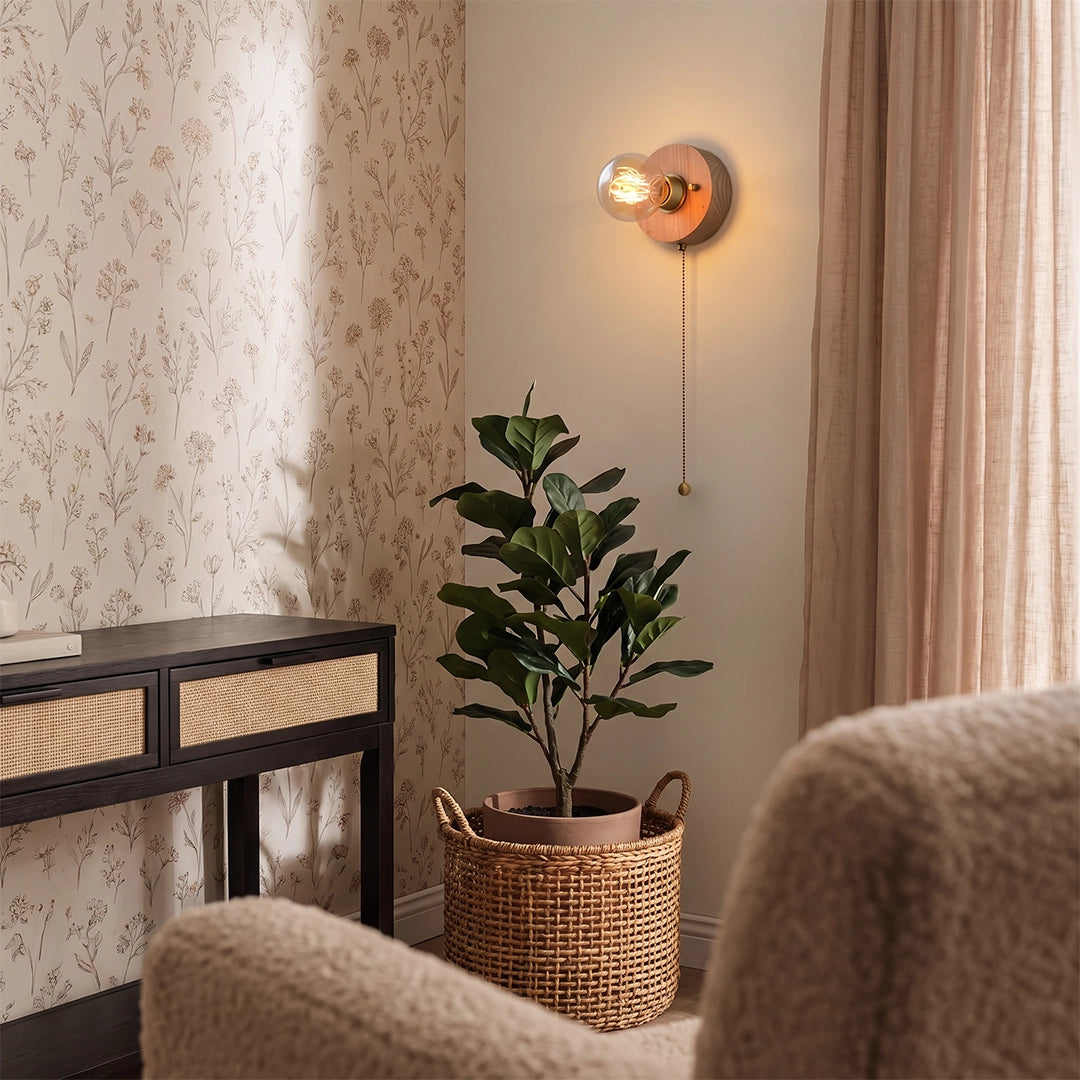 Retro bedside wall light illuminating a cozy corner with a plant, sideboard, and soft furnishings.