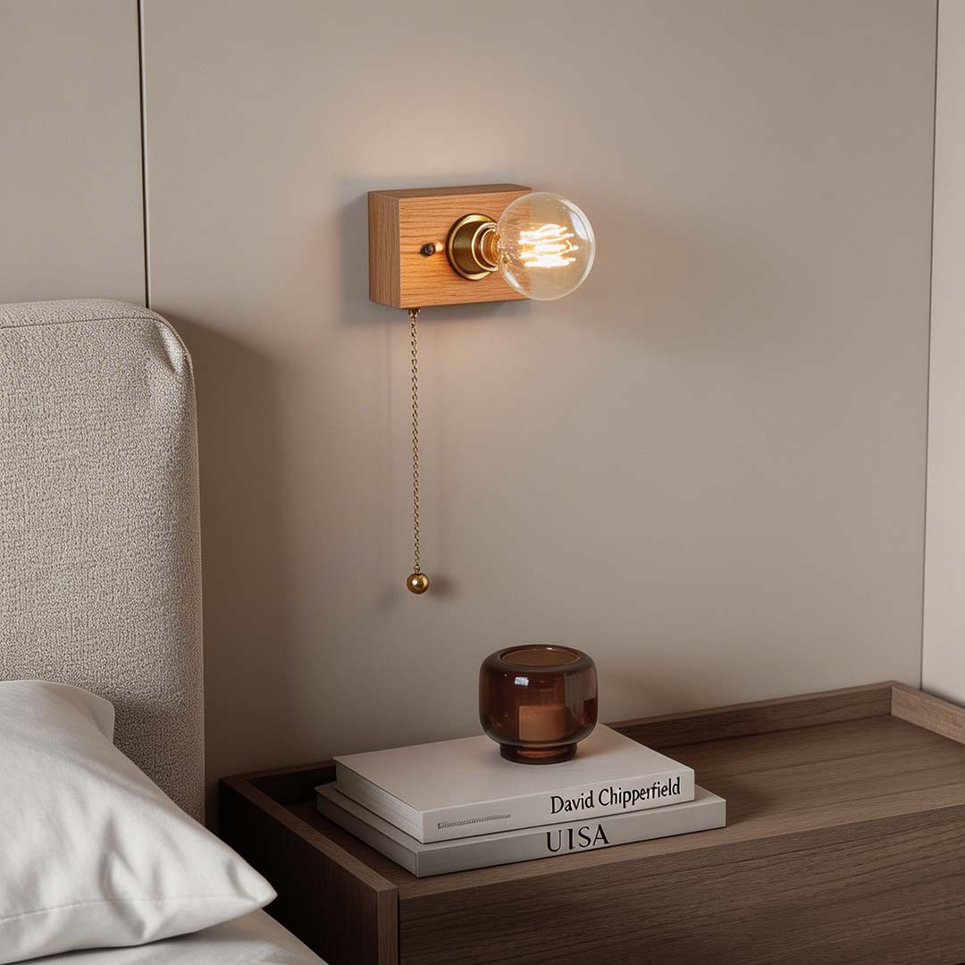 Retro bedside wall light with a wooden and brass design, providing warm illumination above a nightstand.
