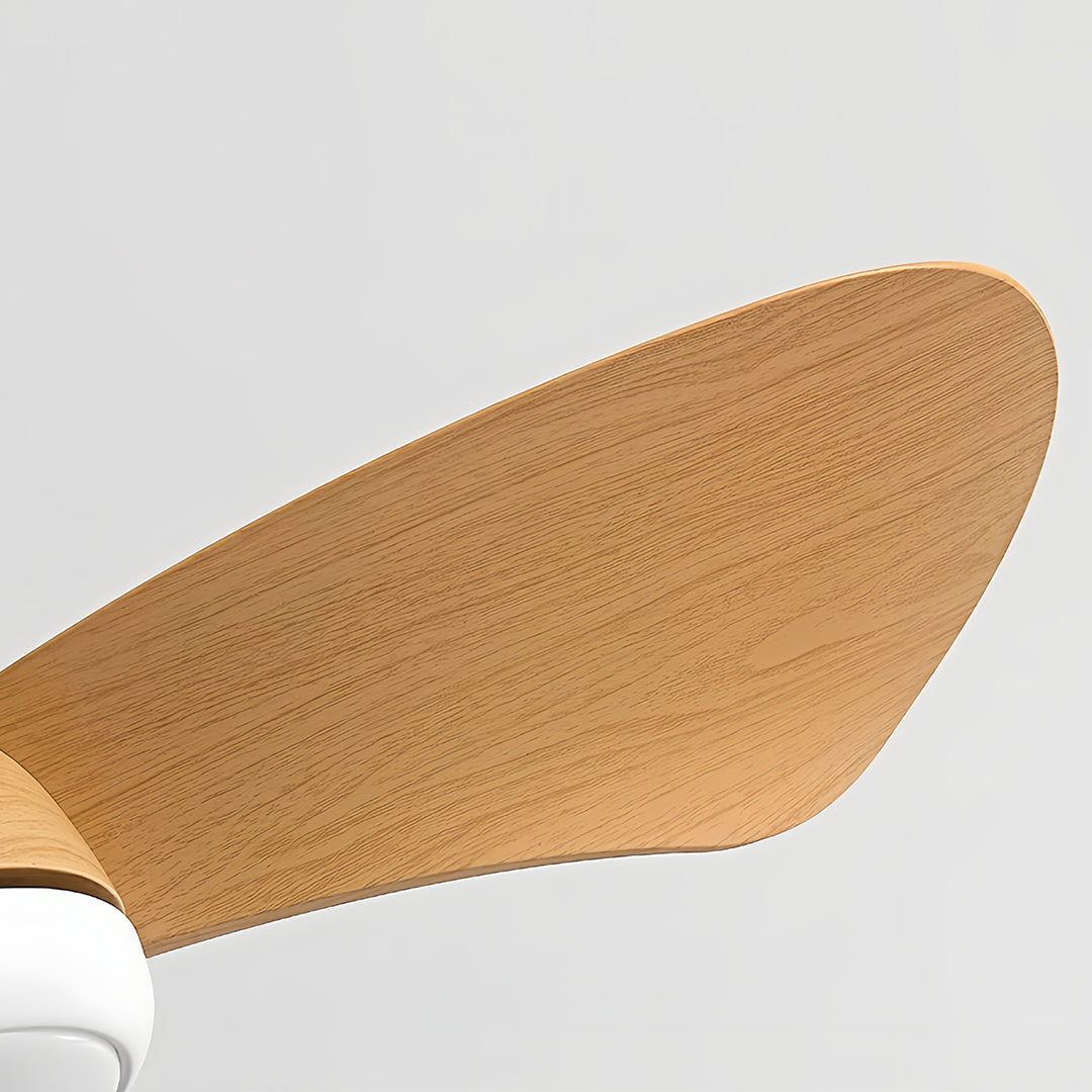 Close-up detail of retro ceiling fan with light highlighting textured woven blade construction pattern