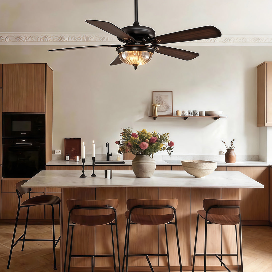 Retro ceiling fan light installed above a kitchen island in a warm vintage interior.