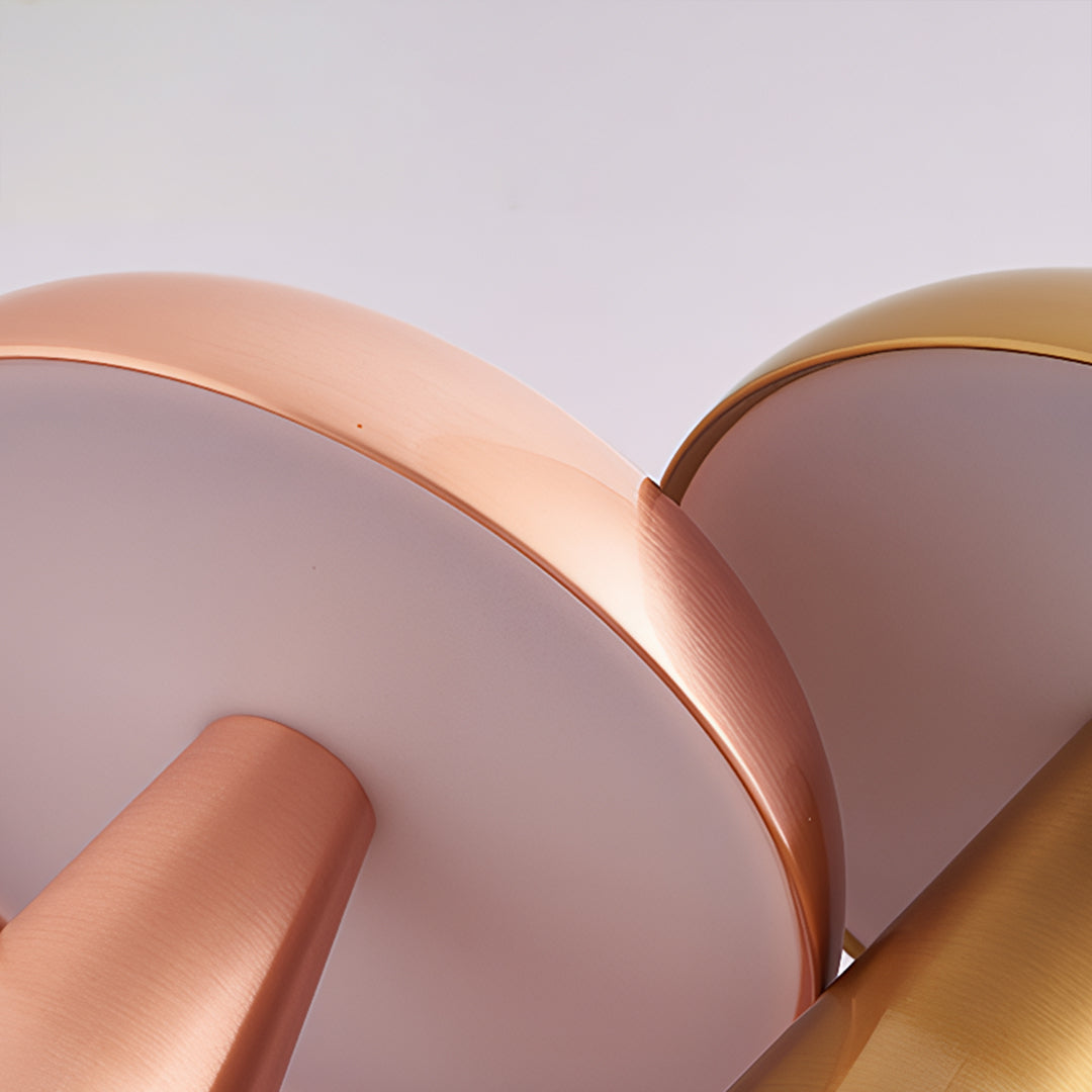 Close-up detail of retro metal table lamp showing copper dome and smooth gradient stem