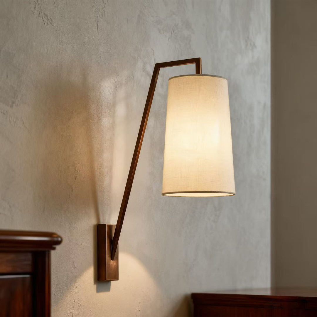 Retro wall lights mounted on textured concrete wall creating ambient lighting in contemporary bedroom setting