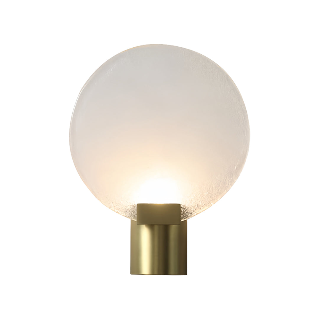 Contemporary wall lights featuring brass mounting and ribbed glass shade with warm ambient lighting
