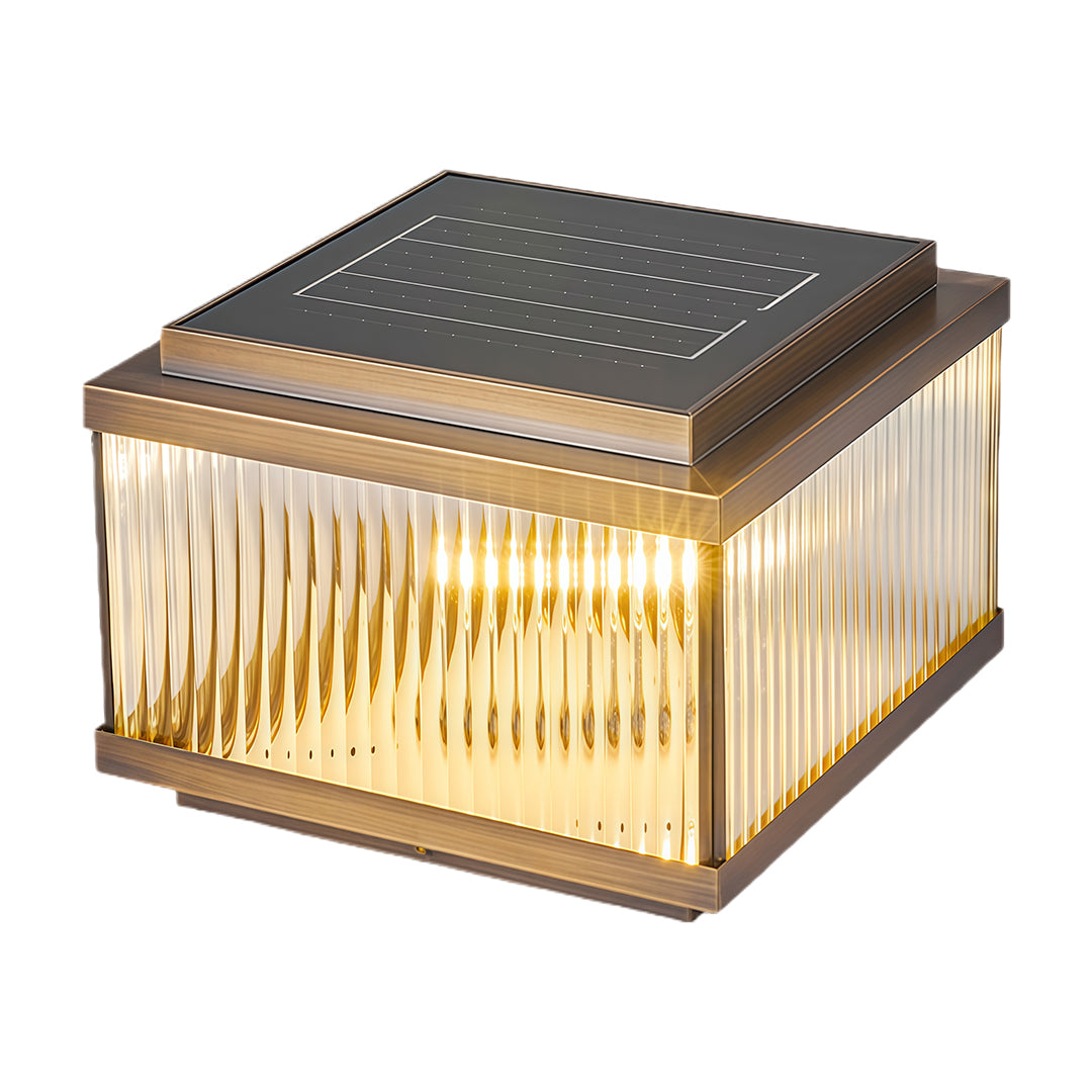 Modern copper pillar light featuring ribbed glass design with warm glow and contemporary dark metal top