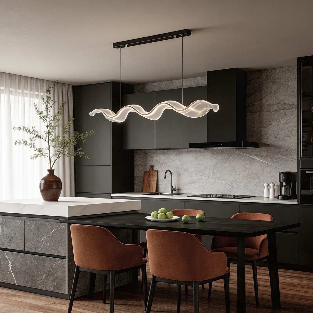 Ribbon pendant light with a sleek wave design, illuminating a modern dining area.