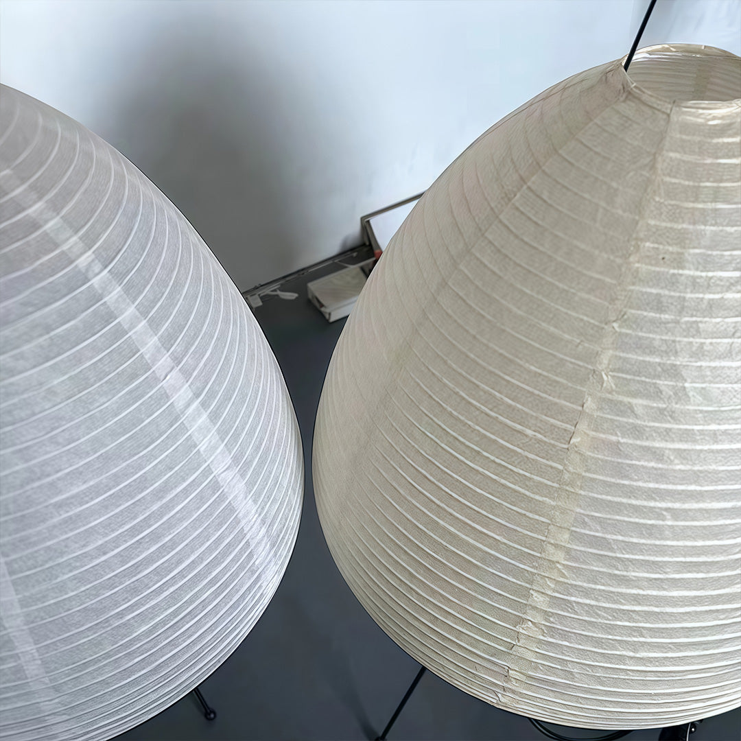 This rice paper table lamp features a wabi-sabi minimalist design, delivering gentle illumination that enhances serene and elegant home décor.