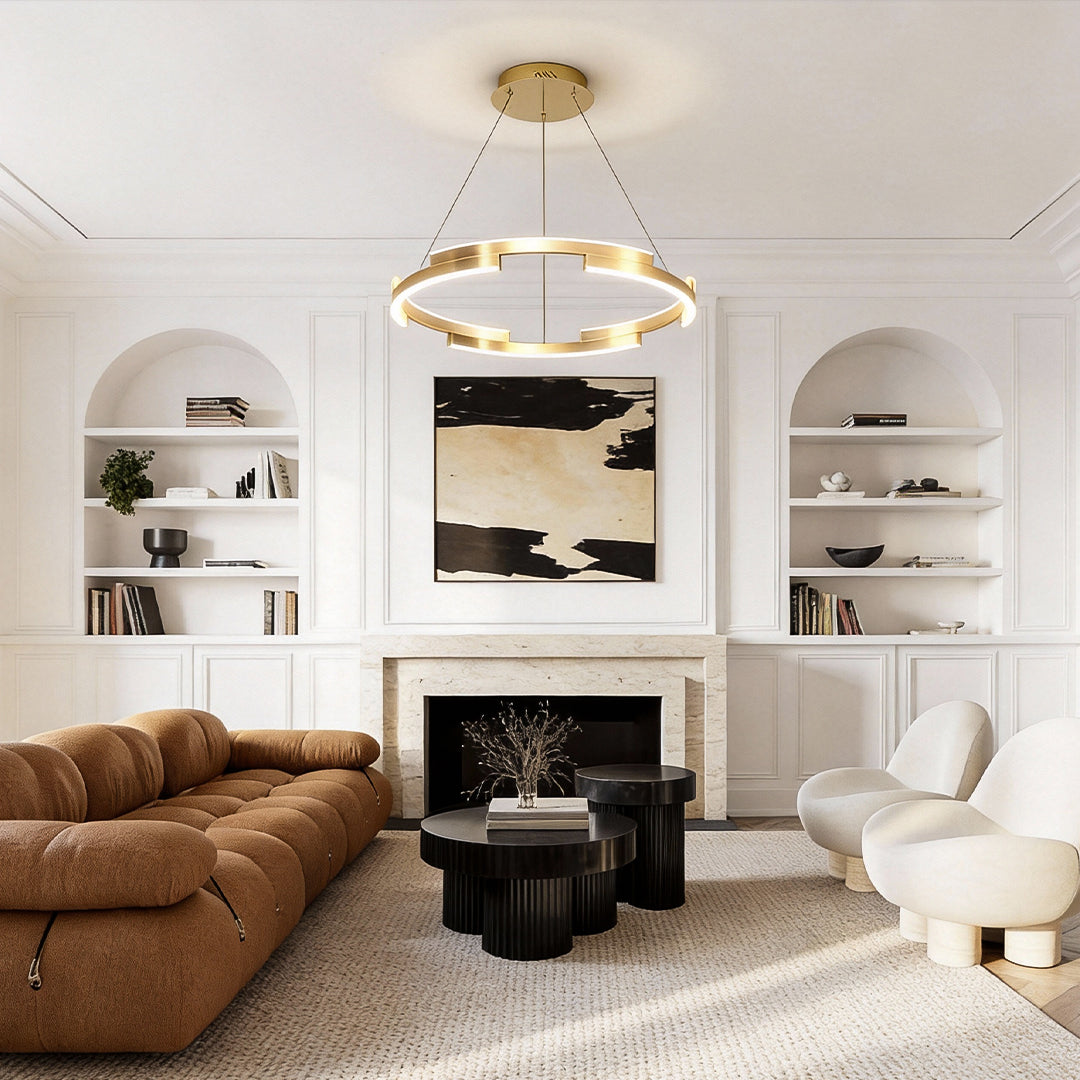 Ring chandelier brass illuminating a modern living room with warm, ambient glow.