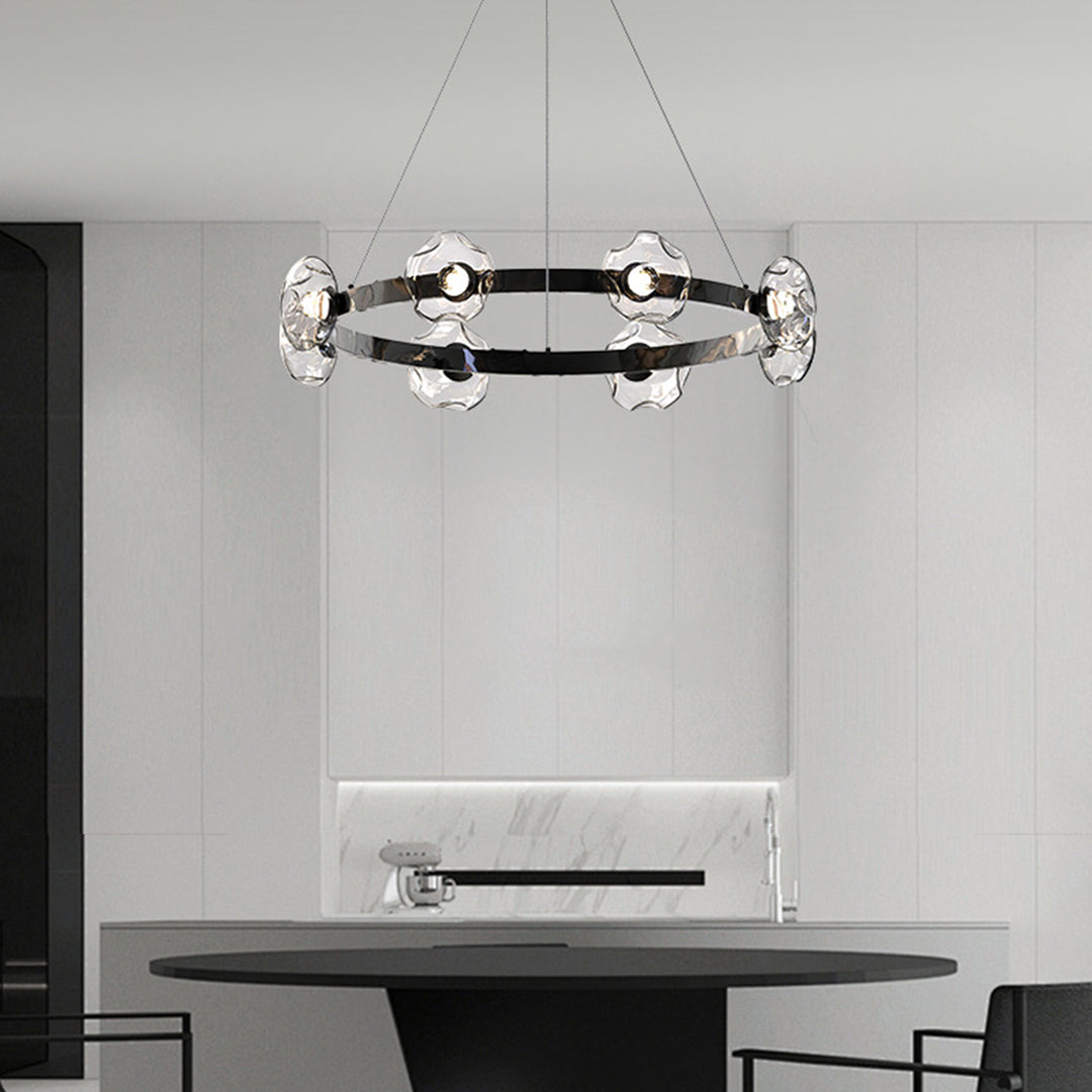 Ring chandelier with modern circular design installed in minimalist bathroom with clean white surfaces