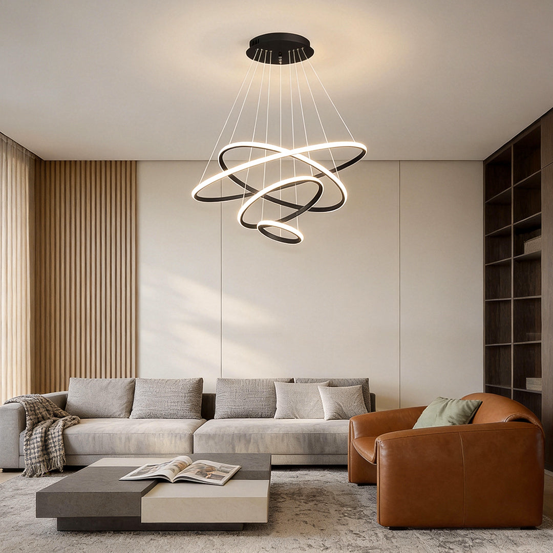 A slim ring chandelier defines a living room seating area without blocking the view.