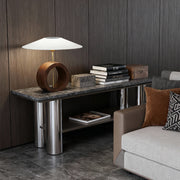 Natural wood table lamp with circular base and large white shade on sideboard table.