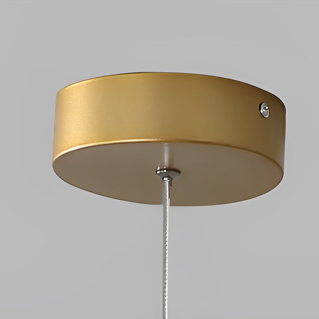 Ring staircase pendant light with a close-up view of its gold rings and sleek design.