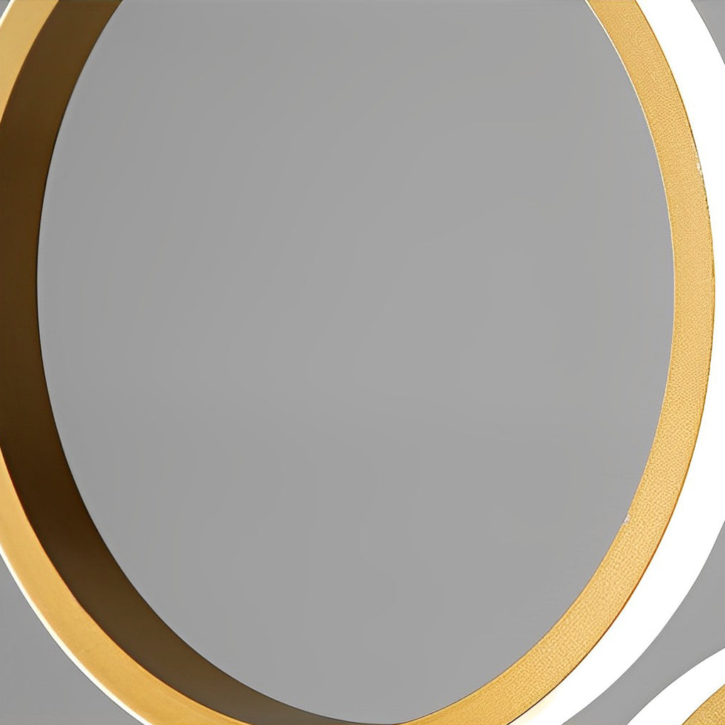 ring-staircase-pendant-light-warm-ambiance-concrete-walls-modern