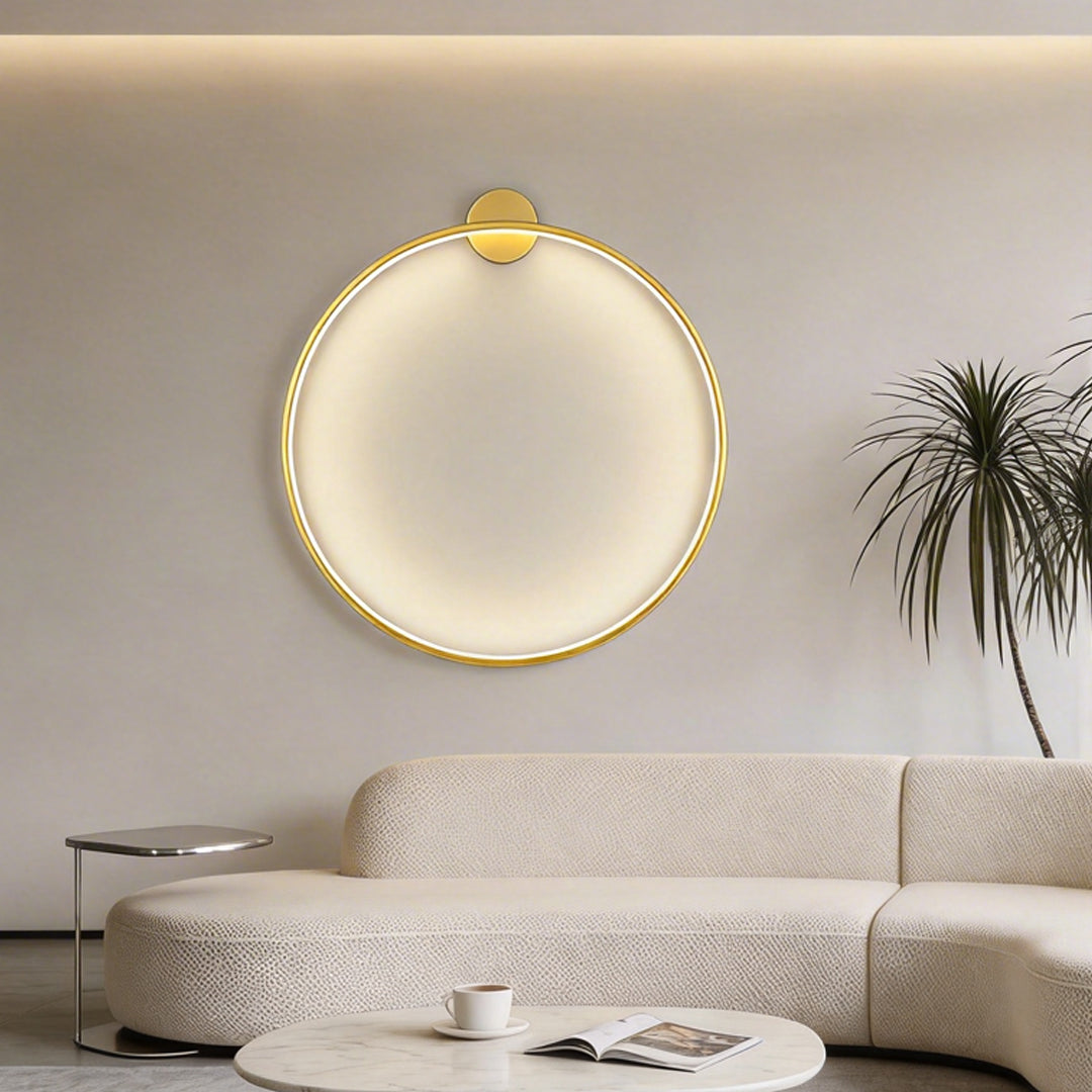 Ring wall lamp enhancing a minimalist interior with warm ambient light.